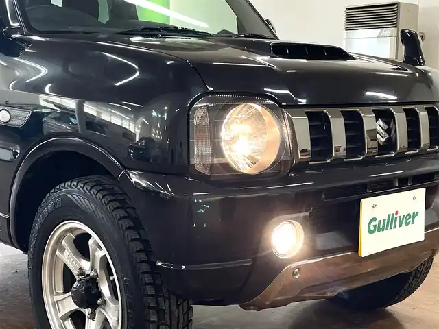 スズキ ジムニー ランドベンチャー 道央・札幌 2015(平27)年 3.2万km ブルーイッシュブラックパール3 4WD/社外SDナビ/・フルセグTV/CD/DVD/BT/SD/グレード専用合皮シート/運転席シートヒーター/ETC/ウインカーミラー/純正フロアマット/純正ドアバイザー/リモコンキー/スペアキー/フォグライト/背面タイヤ/KEELER製16インチAW/ヘッドライトレベライザー/新車時保証書/取扱説明書