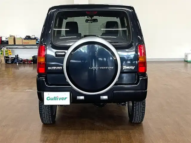 スズキ ジムニー ランドベンチャー 道央・札幌 2015(平27)年 3.2万km ブルーイッシュブラックパール3 4WD/社外SDナビ/・フルセグTV/CD/DVD/BT/SD/グレード専用合皮シート/運転席シートヒーター/ETC/ウインカーミラー/純正フロアマット/純正ドアバイザー/リモコンキー/スペアキー/フォグライト/背面タイヤ/KEELER製16インチAW/ヘッドライトレベライザー/新車時保証書/取扱説明書