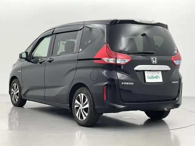 ホンダ フリード ハイブリット EX 熊本県 2018(平30)年 3.1万km プレミアムスパークルブラックパール 純正ナビ（ＣＤ・ＤＶＤ・フルセグ・ＢＴ・ＳＤ・ｉｐｏｄ・ＡｐｐｌＣａｒＰｌａｙ）/バックカメラ　/社外前後ドライブレコーダー　/ビルトインＥＴＣ　/両側パワースライドドア/前席シートヒーター　/ホンダセンシング/・衝突軽減ブレーキ/・アダブティブクルーズコントロール/・車線維持支援システム/横滑り防止/ハーフレザーシート/純正フロアマット/純正１５インチAW/オートライト/LEDヘッドライト/スマートキー/プッシュスタート