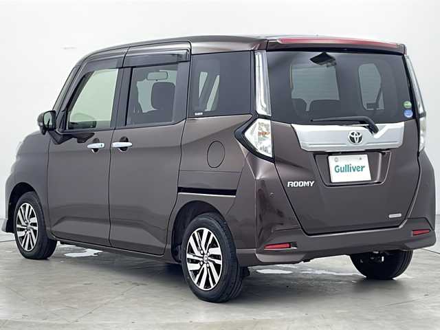トヨタ ルーミー カスタムG 道央・札幌 2023(令5)年 1.1万km プラムブラウンパールクリスタルシャイン ・4WD/・純正ナビ&TV&CD&DVD&SD&BT/・バックカメラ/・両側パワースライドドア/・スマートアシスト/・衝突回避支援ブレーキ/・車線逸脱警報/・先行車発進お知らせ/・アダプティブクルーズコントロール/・ふらつき警報/・前席シートヒーター/・アイドリングストップ/・プッシュスタート/・コーナーセンサー/・LEDヘッドライト/・オートライト/・フォグランプ/・スマートキー/・純正14インチAW