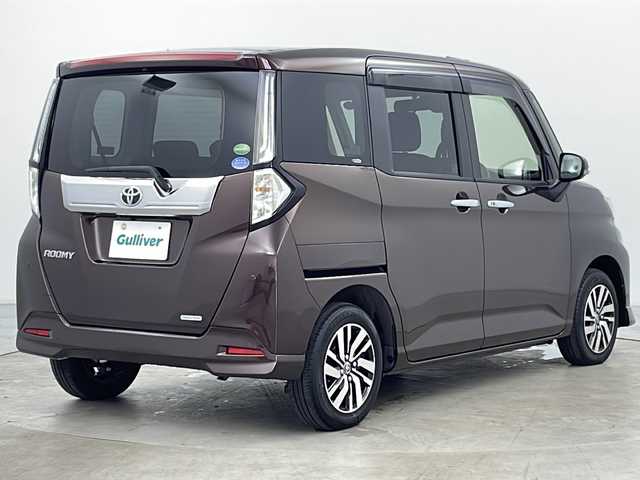 トヨタ ルーミー カスタムG 道央・札幌 2023(令5)年 1.1万km プラムブラウンパールクリスタルシャイン ・4WD/・純正ナビ&TV&CD&DVD&SD&BT/・バックカメラ/・両側パワースライドドア/・スマートアシスト/・衝突回避支援ブレーキ/・車線逸脱警報/・先行車発進お知らせ/・アダプティブクルーズコントロール/・ふらつき警報/・前席シートヒーター/・アイドリングストップ/・プッシュスタート/・コーナーセンサー/・LEDヘッドライト/・オートライト/・フォグランプ/・スマートキー/・純正14インチAW