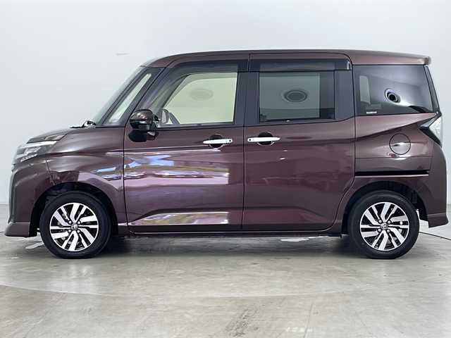 トヨタ ルーミー カスタムG 道央・札幌 2023(令5)年 1.1万km プラムブラウンパールクリスタルシャイン ・4WD/・純正ナビ&TV&CD&DVD&SD&BT/・バックカメラ/・両側パワースライドドア/・スマートアシスト/・衝突回避支援ブレーキ/・車線逸脱警報/・先行車発進お知らせ/・アダプティブクルーズコントロール/・ふらつき警報/・前席シートヒーター/・アイドリングストップ/・プッシュスタート/・コーナーセンサー/・LEDヘッドライト/・オートライト/・フォグランプ/・スマートキー/・純正14インチAW