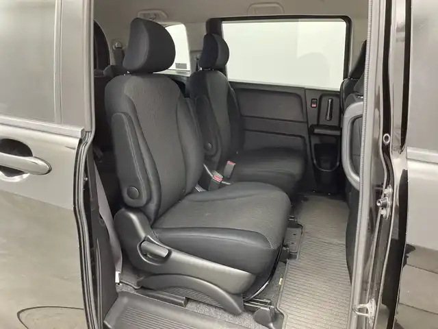 ホンダ フリード ハイブリット ジャストセレクション+ 新潟県 2013(平25)年 9.8万km プレミアムスパークルブラックパール クルーズコントロール/両側パワースライドドア/横滑り防止装置/ＥＴＣ・ステアリングスイッチ/両側パワースライドドア/純正ディーラーオプションナビ/フルセグテレビ/スタッドレスタイヤ１５インチ
