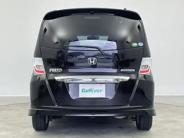 ホンダ フリード ハイブリット ジャストセレクション+ 新潟県 2013(平25)年 9.8万km プレミアムスパークルブラックパール クルーズコントロール/両側パワースライドドア/横滑り防止装置/ＥＴＣ・ステアリングスイッチ/両側パワースライドドア/純正ディーラーオプションナビ/フルセグテレビ/スタッドレスタイヤ１５インチ