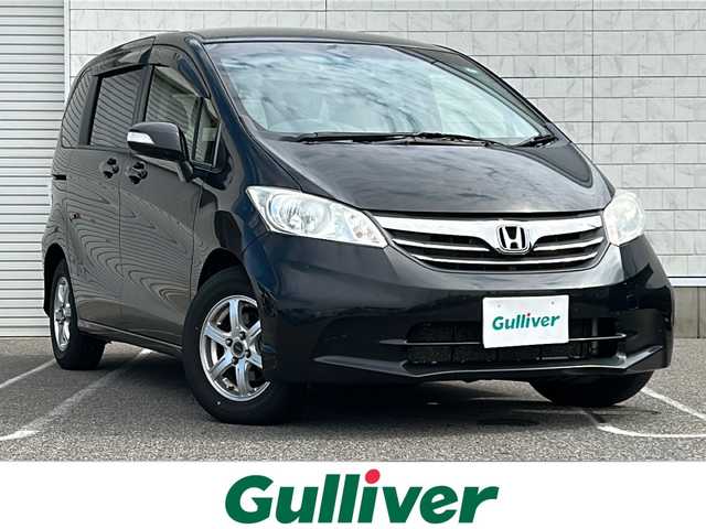 ホンダ フリード G ジャストセレクション 新潟県 2013(平25)年 14.2万km プレミアムスパークルブラックパール フリップダウンモニター/純正ナビ/（AM/FM、CD、DVD、ワンセグ）/ETC/片側パワースライド/バックカメラ/ウォークスルー/横滑り防止/電動電格ミラー/スマートキー/スペアキー/オートライト/キセノンヘッドライト/純正フロアマット