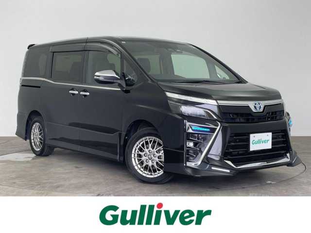 トヨタ ヴォクシー ハイブリッド ZS 煌Ⅲ 大分県 2021(令3)年 7.1万km ブラック ALPINEナビ/フルセグ/DVD/Bluetooth/HDMI/USB/バックカメラ/トヨタセーフティーセンス /ALPINEフリップダウンモニター/ビルトインETC/両側パワースライドドア/オートLEDライト/前後ドライブレコーダー/前席シートヒーター /純正16インチAW/純正フロアマット/スマートキーX2/保証書