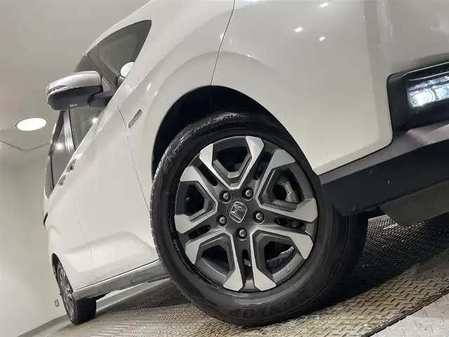 ホンダ フリード ハイブリット クロスター ホンダセンシング 愛知県 2020(令2)年 2.3万km プラチナホワイトパール 純正９incインターナビ/CD/DVD/BT/フルセグTV/HDMI/バックカメラ/ホンダセンシング/衝突軽減ブレーキ/レーンキープアシスト/標識検知/先行車発進お知らせ機能/アダクティブクルーズコントロール/Cパッケージ/●ロールサンシェード/●IRカット〈遮熱〉/UVカット機能付フロントウインドウガラス/IRカット〈遮熱〉/スーパーUVカットフロントドアガラス/●コンフォートビューパッケージ/親水/ヒーテッドドアミラー/フロントドア撥水ガラス＋熱線入りフロントウインドウ/●運転席&助手席シートヒーター/●プラズマクラスター搭載フルオート・エアコンディショナー /両側パワースライドドア/ETC/ドライブレコーダー前後（動作未確認）/アダクティブコーナリングライト/LEDヘッドライト/スマートキー/プッシュスタート