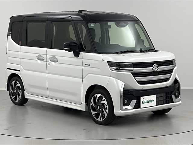 スズキ スペーシア カスタム HYBRID XS 福島県 2025(令7)年 0.1千km ピュアホワイトパール/ブラック2トーン /届出済未使用車//全方位モニター付きメモリ-ナビゲーション/スズキコネクト対応通信機装着車(195800円)//全方位モニター//ヘッドアップディスプレイ//フルセグＴＶ//レーダークルーズコントロール//シートヒーター//両側電動スライドドア//ステアリングヒーター//クリアランスソナー//4WD//後席オットマン//オートハイビーム//LEDライト//フォグライト//デュアルセンサーブレーキサポートII//取説・保証書