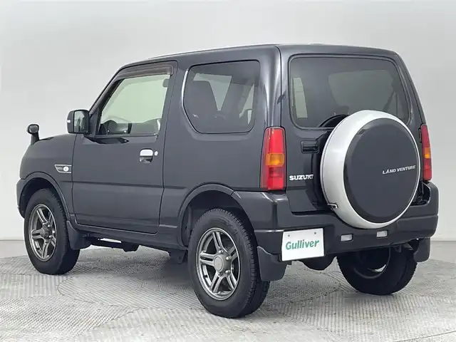 スズキ ジムニー ランドベンチャー 道央・札幌 2016(平28)年 5.7万km ブルーイッシュブラックパール3 ・4WD/・社外メモリナビ(CN-E330D)/・CD/DVD／Bluetooth／ワンセグ/・ステアリングスイッチ/・ETC/・フォグランプ/・電動格納ミラー/・ドアバイザー/・ハーフレザーシート/・純正１６インチAW/・背面タイヤ/・ABS/・リモコンキー/・保証書