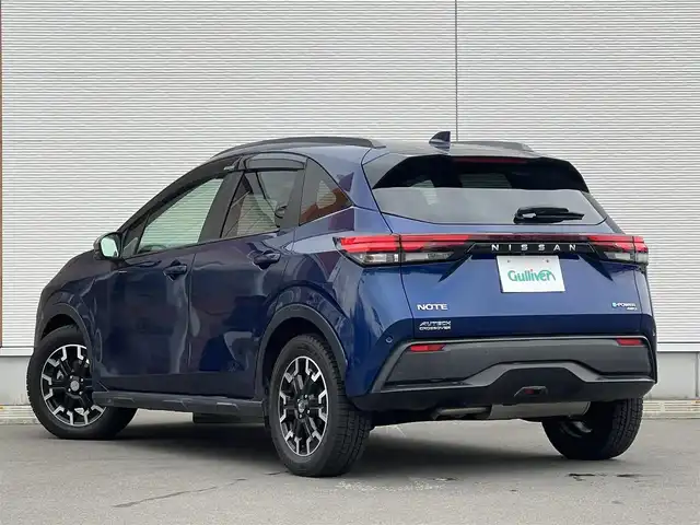 日産 ノート オーテック クロスオーバーFOUR 秋田県 2022(令4)年 0.9万km オーロラフレアブルーパール 4WD/純正メモリナビ/ BT/USB/フルセグ/アラウンドビューモニター/デジタルインナーミラー /プロパイロット/ハンドル支援/エマージェンシーブレーキ/レーダークルーズコントロール/レーンキープ /コーナーセンサー /ワイヤレス充電/合皮シート/前席シートヒーター /ステアリングヒーター/オートライト/LEDヘッドライト/フォグライト/リアフォグ/ビルトインETC2.0/前後ドライブレコーダー/フロントデアイサー/純正フロアマット/ドアバイザー
