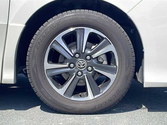 トヨタ ノア Si ダブルバイビーⅡ 三重県 2019(令1)年 2.4万km ラグジュアリーホワイトパールクリスタルシャインガラスフレーク プッシュスタート/電動格納ミラー/両側パワースライドドア/アイドリングストップ/ビルトインETC/オートライト/オートマチックハイビーム/レーンキープアシスト/衝突軽減ブレーキ/クルーズコントロール/コーナーセンサー/ステアリングスイッチ/革巻きステアリング/横滑り防止/前方ドライブレコーダー/リアサンシェード/純正9型ナビ(AM/FM/CD/TV/BT)/フルセグTV/バックカメラ/純正フロアマット/USB入力端子2ヶ所/ハーフレザーシート/禁煙車