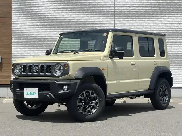 スズキ ジムニー ノマド FC 秋田県 2025(令7)年 0.1万km未満 アイボリー 衝突軽減システム/４WD/LEDヘッドライト/スマートキー/アイドリングストップ/ダウンヒルアシストコントロール/レーンキープアシスト/プッシュスタート/コーナーセンサー/前席シートヒーター/純正アルミ/背面タイヤ/純正フロアマット/ETC/ミラーヒーター/ステアリングスイッチ/ヘッドランプウォッシャー/オートライト/オートエアコン/パワーステアリング/パワーウィンドウ/横滑り防止/電動格納ウィンカーミラー