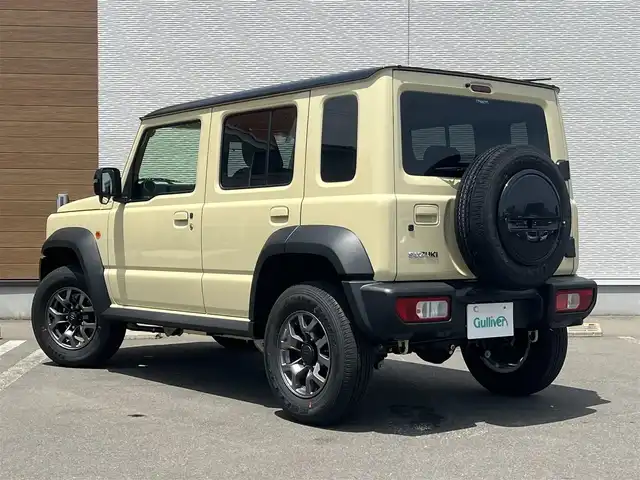 スズキ ジムニー ノマド FC 秋田県 2025(令7)年 0.1万km未満 アイボリー 衝突軽減システム/４WD/LEDヘッドライト/スマートキー/アイドリングストップ/ダウンヒルアシストコントロール/レーンキープアシスト/プッシュスタート/コーナーセンサー/前席シートヒーター/純正アルミ/背面タイヤ/純正フロアマット/ETC/ミラーヒーター/ステアリングスイッチ/ヘッドランプウォッシャー/オートライト/オートエアコン/パワーステアリング/パワーウィンドウ/横滑り防止/電動格納ウィンカーミラー