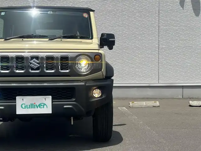 スズキ ジムニー ノマド FC 秋田県 2025(令7)年 0.1万km未満 アイボリー 衝突軽減システム/４WD/LEDヘッドライト/スマートキー/アイドリングストップ/ダウンヒルアシストコントロール/レーンキープアシスト/プッシュスタート/コーナーセンサー/前席シートヒーター/純正アルミ/背面タイヤ/純正フロアマット/ETC/ミラーヒーター/ステアリングスイッチ/ヘッドランプウォッシャー/オートライト/オートエアコン/パワーステアリング/パワーウィンドウ/横滑り防止/電動格納ウィンカーミラー