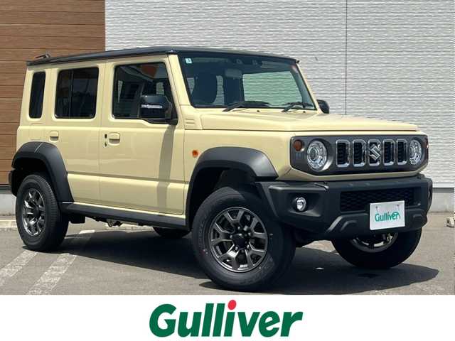 スズキ ジムニー ノマド FC 秋田県 2025(令7)年 0.1万km未満 アイボリー 衝突軽減システム/４WD/LEDヘッドライト/スマートキー/アイドリングストップ/ダウンヒルアシストコントロール/レーンキープアシスト/プッシュスタート/コーナーセンサー/前席シートヒーター/純正アルミ/背面タイヤ/純正フロアマット/ETC/ミラーヒーター/ステアリングスイッチ/ヘッドランプウォッシャー/オートライト/オートエアコン/パワーステアリング/パワーウィンドウ/横滑り防止/電動格納ウィンカーミラー