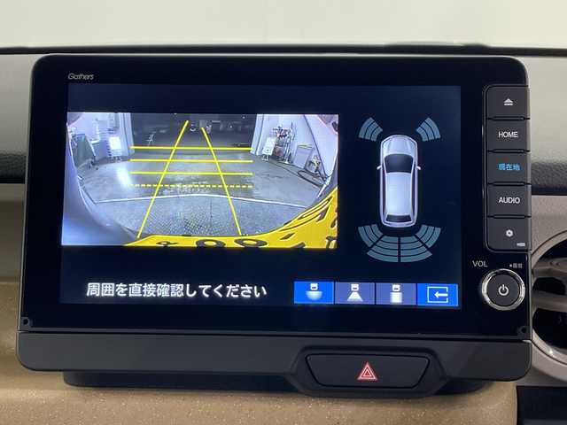ホンダ Ｎ ＢＯＸ 栃木県 2024(令6)年 0.8万km ルナシルバーM 9型純正ナビ/（CD/DVD/Bluetooth/TV/USB/Applecarplay/AndroidAuto)/バックカメラ/ステアリングリモコン/ETC/前方ドライブレコーダー/アダプティブクルコン/前席シートヒーター/両側パワースライドドア/シートリフター/オートリトラミラー/LEDヘッドライト/ホンダセンシング/・衝突軽減ブレーキ/・パーキングセンサー警報/・踏み間違い衝突軽減システム/・路外逸脱抑制機能/スマートキー