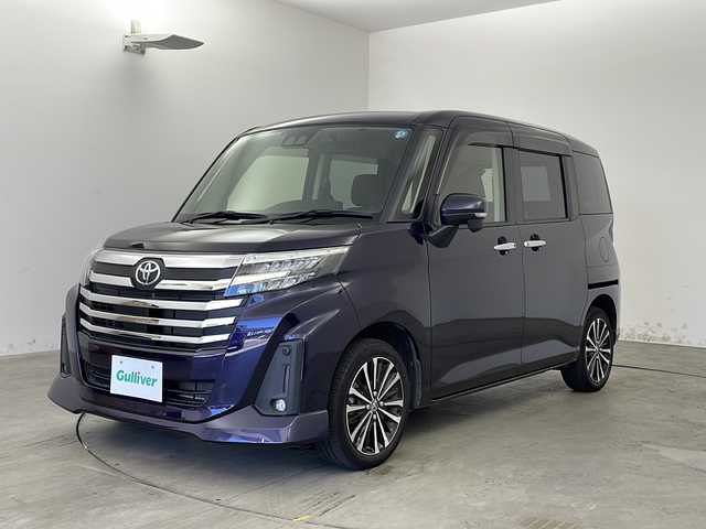 トヨタ ルーミー カスタムG－T 兵庫県 2022(令4)年 5.9万km クールバイオレットクリスタルシャイン ・純正ディスプレイオーディオ/（フルセグ・Apple Car Play・Android Auto）/・スマートアシストIII/・衝突回避支援ブレーキ機能/・衝突警報機能/・誤発進抑制制御機能/・車線逸脱警報機能/・路側逸脱警報/・ふらつき警報/・先行車発進お知らせ機能/・標識認識機能/・オートマチックハイビーム/・アダクティブドライブビーム/・サイドビューランプ/・アダクティブクルーズコントロール/・横滑り防止装置/・両側パワースライドドア/・ビルトインETC/・バックカメラ/・コーナーセンサー/・LEDオートライト/・フォグランプ/・アイドリングストップ/・純正15インチアルミホイール/・純正フロアマット/・ヒルスタートアシストコントロール/・電動パーキングブレーキ/・ブレーキホールド/・ISOFIX/・スマートキー/・プッシュスタート/・W＋サイドエアバック/・カーテンエアバック