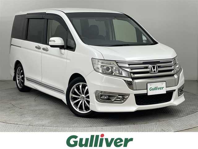 ホンダ ステップワゴン スパーダ Z クールスピリット 道央・札幌 2014(平26)年 6.7万km ホワイトオーキッドパール ・4WD/・寒冷地仕様/・純正ナビ/・フルセグ/BT/CD/DVD/・フリップダウンモニター/・両側パワースライドドア/・ETC/・クルーズコントロール/・パドルシフト/・ステアリングスイッチ/・アイドリングストップ/・スマートキー/・純正AW付冬タイヤ積込/【205/60R16】