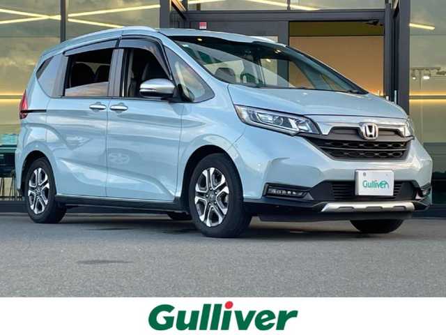 ホンダ フリード クロスター 東京都 2023(令5)年 3.6万km フィヨルドミストパール ワンオーナー/純正ナビ(VXM-234VFi)/【DVD/CD/FM/AM/TV/ipod/SD/USB/BT/AUX】/バックカメラ/ビルトインETC/レーダークルーズコントロール/前方ドライブレコーダー(DRH-224SD)/両側電動スライドドア/ハーフレザーシート/衝突軽減ブレーキ/バックソナー/後席サンシェード/LEDヘッドライト/フォグランプ/純正15インチAW/プッシュスタート/スマートキー/スペアキー