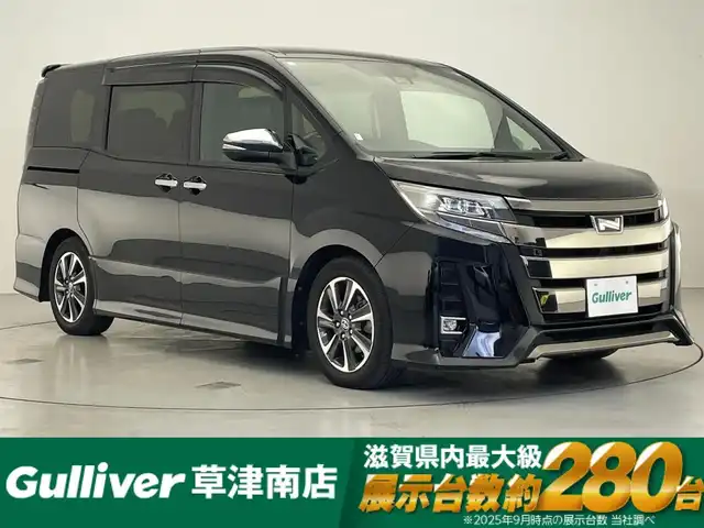 トヨタ ノア Si ダブルバイビーⅢ 滋賀県 2020(令2)年 3.9万km ブラック 社外9型ナビ/（CD/DVD/フルセグTV/BT）/トヨタセーフティセンス/・プリクラッシュセーフティ/・レーンディパーチャーアラート/・オートマチックハイビーム/社外フリップダウンモニター/ハーフレザーシート/バックカメラ/クルーズコントロール/クリアランスソナー/両側パワースライドドア/LEDヘッドライト/純正フロアマット/純正16インチAW
