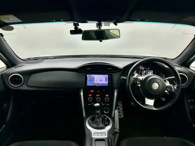 トヨタ ８６ GT 宮城県 2016(平28)年 4.2万km クリスタルホワイトパール モデリスタエアロ（フロント/サイド/リア）/柿本改マフラー/ケンウッド製ナビ/（TV/CD/DVD/Bluetooth/AM/FM/iPod/USB/SD/SMARTUSEN）/バックカメラ/ドライブレコーダー（ケンウッド製）/パドルシフト/ドライブモードセレクトスイッチ/（スポーツモード/スノーモード）/クルーズコントロール/スカッフプレート（運転席/助手席）/純正17インチアルミホイール/純正フロアマット/スペアキー