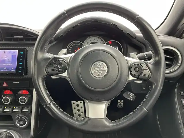 トヨタ ８６ GT 宮城県 2016(平28)年 4.2万km クリスタルホワイトパール モデリスタエアロ（フロント/サイド/リア）/柿本改マフラー/ケンウッド製ナビ/（TV/CD/DVD/Bluetooth/AM/FM/iPod/USB/SD/SMARTUSEN）/バックカメラ/ドライブレコーダー（ケンウッド製）/パドルシフト/ドライブモードセレクトスイッチ/（スポーツモード/スノーモード）/クルーズコントロール/スカッフプレート（運転席/助手席）/純正17インチアルミホイール/純正フロアマット/スペアキー