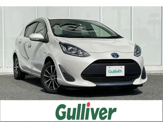 トヨタ アクア S スタイルブラック 福岡県 2020(令2)年 6.2万km ホワイトパールクリスタルシャイン 純正7インチナビ　/(AM.FM.CD.TV.Bluetooth)/バックカメラ　/衝突軽減ブレーキ　/クリアランスソナー　/レーンアシスト　/オートライト　/オートマチックハイビーム　/ＥＴＣ　/ドラレコ前/Ｂｌｕｅｔｏｏｔｈ接続　/横滑り防止装置　/１５インチ社外ＡＷ　/純正LEDライト/ドアバイザー