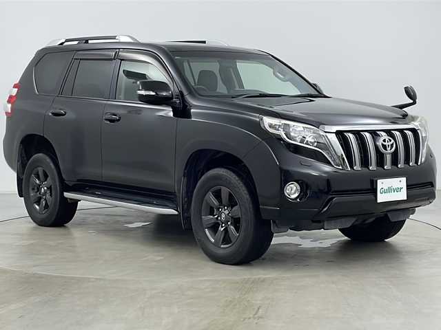 トヨタ ランドクルーザー プラド TX アルジェントクロス 道央・札幌 2014(平26)年 7.4万km ブラック ・4WD/・純正ナビ(TV＆BT＆DVD＆CD)/・バックモニター/・横滑り防止/・クルーズコントロール/・革調シートカバー/・ルーフレール/・サイドステップ/・オートライト/・LEDヘッドライト/・フォグランプ/・電動格納ドアミラー/・ドアミラーウィンカー/・ドアミラーヒーター/・ヘッドライトウォッシャー