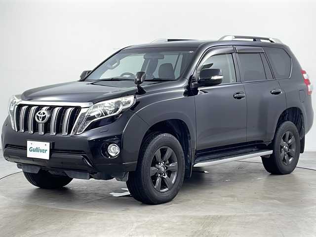 トヨタ ランドクルーザー プラド TX アルジェントクロス 道央・札幌 2014(平26)年 7.4万km ブラック ・4WD/・純正ナビ(TV＆BT＆DVD＆CD)/・バックモニター/・横滑り防止/・クルーズコントロール/・革調シートカバー/・ルーフレール/・サイドステップ/・オートライト/・LEDヘッドライト/・フォグランプ/・電動格納ドアミラー/・ドアミラーウィンカー/・ドアミラーヒーター/・ヘッドライトウォッシャー