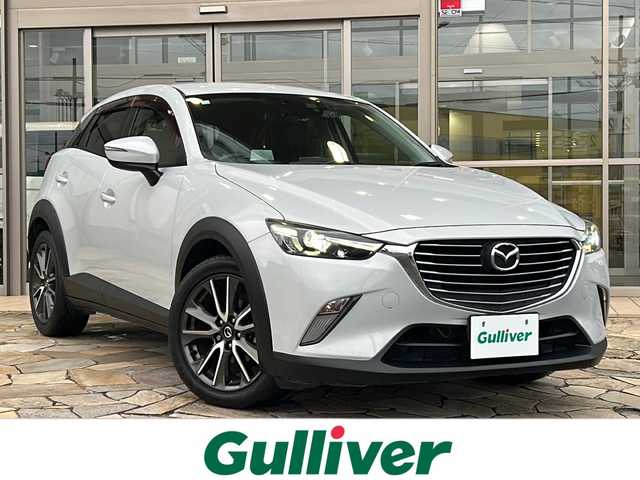 マツダ ＣＸ－３ XD ツーリング 静岡県 2016(平28)年 5.8万km セラミックM 純正ナビ（CD AM FM Bluetooth USB DVD AUX フルセグTV）/バックカメラ/クルーズコントロール/ドライブレコーダー/パドルシフト/ヘッドアップディスプレイ/BOSEサウンドシステム/ハーフレザーシート/LEDヘッドライト/ETC/ステアリングリモコン/プリクラッシュブレーキ/純正フロアマット/プッシュスタート/スマートキー