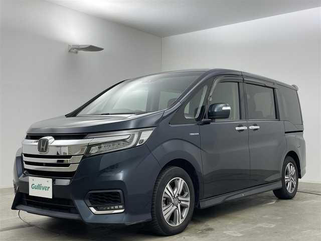 ホンダ ステップワゴン スパーダ ハイブリッド G EX ホンダセンシング 岡山県 2018(平30)年 5.2万km アビニオンブルーメタリック 純正10インチSDナビ/（CD/DVD/BT/フルセグTV/USB/HDMI）/マルチビューカメラ/フリップダウンモニター/両側パワースライドドア/（左側ハンズフリースライド）/ドライブレコーダー（前）/ハーフレザーシート/前席シートヒーター/ビルトインETC/無限フロアマット/衝突軽減ブレーキシステム/追従型クルーズコントロール/LEDヘッドライト/オートハイビーム/オートライト/オートブレーキホールド/後席サンシェイド/ステアリングスイッチ/チルトステアリング/シートリフター/シートバックテーブル/ウインカーミラー/ドアバイザー