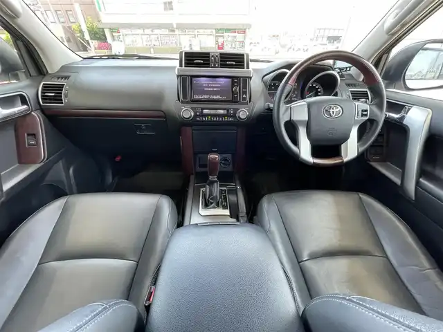 トヨタ ランドクルーザー プラド TX Lパッケージ 青森県 2016(平28)年 5.7万km ホワイトパールクリスタルシャイン 社外１７ＡＷ/7人乗り/純正ＬＥＤヘッドライト/本革シート/（運転席助手席シートヒーター）/純正ＳＤナビフルセグ（ＮＳＺＴ－Ｗ６６Ｔ）/純正１７ＡＷｘ４積み込み/クリアランスソナー/クルーズコントロール/スマートキー（1本）/新車時保証書/取扱説明書