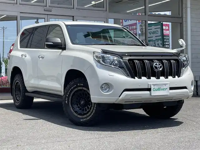トヨタ ランドクルーザー プラド TX Lパッケージ 青森県 2016(平28)年 5.7万km ホワイトパールクリスタルシャイン 社外１７ＡＷ/7人乗り/純正ＬＥＤヘッドライト/本革シート/（運転席助手席シートヒーター）/純正ＳＤナビフルセグ（ＮＳＺＴ－Ｗ６６Ｔ）/純正１７ＡＷｘ４積み込み/クリアランスソナー/クルーズコントロール/スマートキー（1本）/新車時保証書/取扱説明書