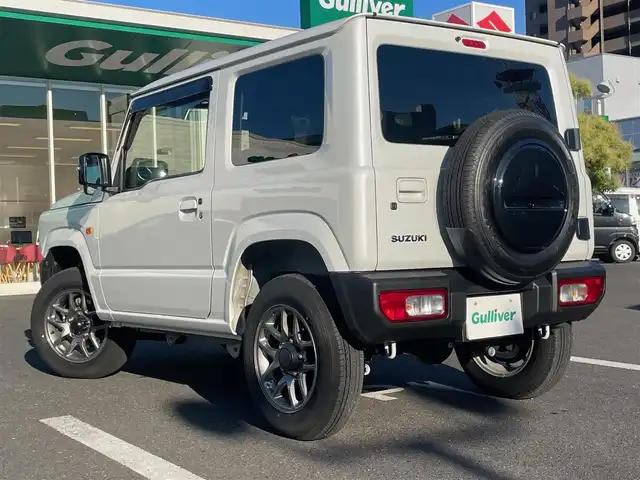 スズキ ジムニー XC 島根県 2024(令6)年 1万km ピュアホワイトP オーディオレス/４WDターボ/クルーズコントロール　/前席シートヒーター　/衝突軽減ブレーキ/レーンキープアシスト　/ダウンヒルアシストコントロール/純正LEDヘッドライト/オートライト/純正16インチアルミホイール/横滑り防止装置/盗難防止装置