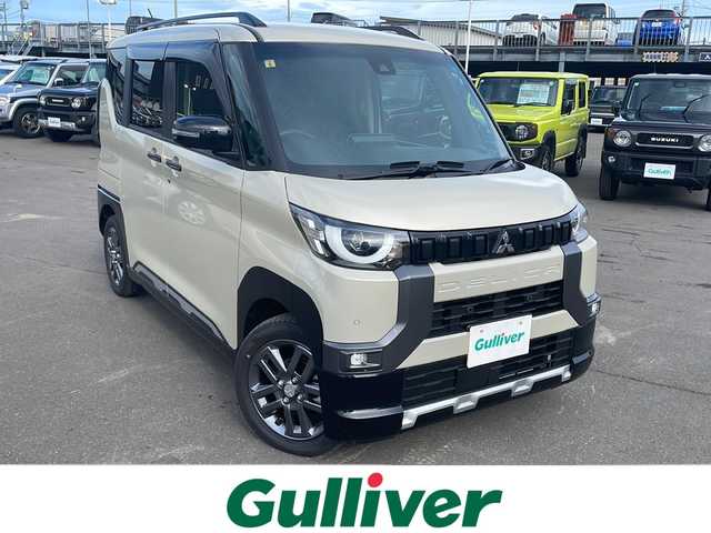 三菱 デリカミニ T プレミアム 道東・釧路十勝 2023(令5)年 0.1万km ベージュ 4WD/ワンオーナー/純正ナビ　/　(AM/FM/CD/DVD/BT)/エンジンスターター/ミラー型ドライブレコーダー/アラウンドビューモニター/バックカメラ/両側パワースライドドア/ハーフレザーシート/ステアリングヒーター/純正15インチAW/社外フロアマット/ドアバイザー/アイドリングストップ/パーキングアシスト/クルーズコントロール/コーナーセンサー/レーンキープアシスト/ダウンヒルアシスト/オートライト/オートマチックハイビーム/ライトレベライザー/フォグランプ/盗難防止装置/ABS/横滑り防止装置/スペアキー