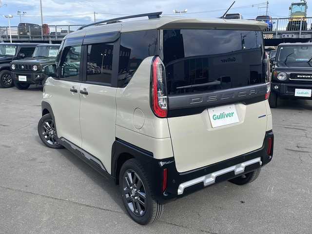 三菱 デリカミニ T プレミアム 道東・釧路十勝 2023(令5)年 0.1万km ベージュ 4WD/ワンオーナー/純正ナビ　/　(AM/FM/CD/DVD/BT)/エンジンスターター/ミラー型ドライブレコーダー/アラウンドビューモニター/バックカメラ/両側パワースライドドア/ハーフレザーシート/ステアリングヒーター/純正15インチAW/社外フロアマット/ドアバイザー/アイドリングストップ/パーキングアシスト/クルーズコントロール/コーナーセンサー/レーンキープアシスト/ダウンヒルアシスト/オートライト/オートマチックハイビーム/ライトレベライザー/フォグランプ/盗難防止装置/ABS/横滑り防止装置/スペアキー