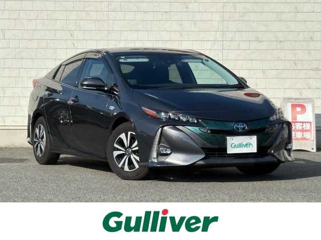 トヨタ プリウス ＰＨＶ A ユーティリティプラス 山口県 2018(平30)年 1.9万km グレーメタリック 11.6型ナビ フルセグTV BT USB AUX/バックカメラ/ビルトイン 2.0ETC/AC100V 1500W電源/衝突被害軽減ブレーキ/レーダークルーズコントロール/レーンアシスト/オートマチックハイビーム/ブラインドスポットモニタ/LEDオートヘッドライト/フォグライト/コーナーセンサー/充電ケーブル有り/スマートキー/前席シートヒーター/ドラレコ/パーキングアシスト/ステアリングリモコン/W サイド カーテン エアバッグ/禁煙車