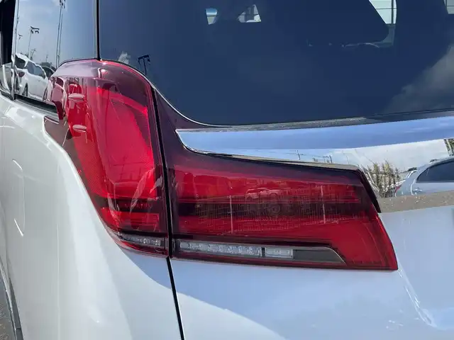 トヨタ アルファード S タイプゴールドⅡ 茨城県 2022(令4)年 2.4万km ホワイトパールクリスタルシャイン 純正ナビ/【AM・FM・USB・BT・TV】/電動リア/オットマン/両側パワスラ/デジタルインナーミラー/レーダークルコン/ETC2.0/Bカメラ/100V電源/MTモード付AT/ブレーキホールド/電動パーキングブレーキ/BSM/後席AAＣ/前方ドラレコ/前後コーナーセンサー