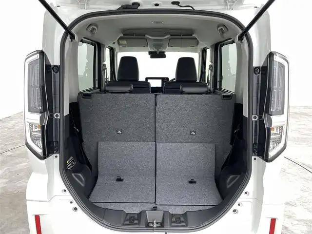 スズキ スペーシア カスタム HYBRID XS ターボ 福島県 2023(令5)年 0.1千km ピュアホワイトP スズキセーフティサポート/・衝突被害軽減ブレーキ/・誤発進抑制機能/・低速時ブレーキサポート/・先行車発進お知らせ機能/・標識認識機能/・車線逸脱警報装置/・電子パーキング/・オートブレーキホールド/アダプティブクルーズコントロール/純正ナビゲーション/・型番：NVF-0239zs03/・AppleCarPlay/AndroidAuto/・フルセグTV/BT/FM/AM/CD/DVD/・バックカメラ/・アラウンドビューモニター/革巻きステアリング/・ステアリングスイッチ/・パドルシフト/・ステアリングヒーター/ハーフレザーシート/・シートヒーター/・ベンチシート/USB充電ポート/プッシュスタート/・スマートキー/電動格納ミラー/・ウィンカーミラー/・オートミラー/LEDヘッドライト/・オートライト/・フォグランプ/純正フロアマット/純正15インチAW
