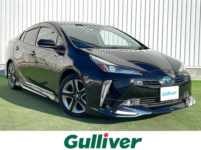 トヨタ プリウス A ツーリングセレクション 香川県 2020(令2)年 5.7万km アティチュードブラックマイカ Toyota Safety Sense P/・プリクラッシュセーフティシステム（歩行者検知機能付衝突回避支援タイプ）/・レーンディパーチャーアラート（ステアリング制御機能付）/・オートマチックハイビーム/・レーダークルーズコントロール/純正９インチメモリナビ/アドバンストパーク/バックカメラ/クリアランスソナー/社外エアロ（フロント・サイド・リアアンダー）/純正17インチアルミホイール/ETC2.0/パーキングサポートブレーキ/エンジンスターター/ブラインドスポットモニター/ナビレディパッケージ/RCTA（リヤクロストラフィックアラート）/ふらつき検知/ISOFIX/LEDヘッドライト/LEDフォグランプ/運転席パワーシート/前席ヒートシーター/前席エアシート/プッシュスタート/スマートキー/ステアリングリモコン/ウィンカーミラー/純正フロアマット/純正ドアバイザー/純正トノカバー