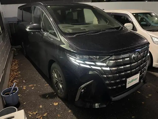 トヨタ アルファード Z 新潟県 2025(令7)年 0.4万km ブラック ワンオーナー/純正ホイール夏タイヤ装着/社外ホイールスタッドレスタイヤ車載/メモリナビ/フルセグテレビ/バックカメラ/アラウンドビューモニター/ウィンカーミラー/クルーズコントロール/キャプテンシート/プッシュスタート/両側パワースライドドア/パワーバックドア/ETC２．０/シートメモリー/運転席後席シートヒーター、クーラー/ステアリングヒーター/ブレーキホールド/電動パーキングブレーキ/ECOモード/置くだけ充電/SOSスイッチ/スペアキー1個
