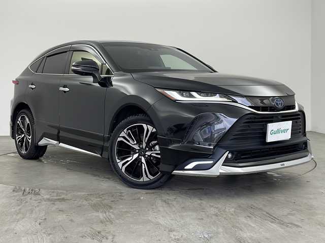 トヨタ ハリアー ハイブリッド Z レザーパッケージ 兵庫県 2021(令3)年 4.4万km プレシャスブラックパール ・純正12.3インチナビ&TV&Bluetooth&USB/HDMI接続&Apple CarPlay/Android Auto/・JBLプレミアムサウンド/・モデリスタエアロパーツ（フロント/サイド/リア）/・アラウンドビューモニター/・トヨタセーフティセンス/・プリクラッシュセーフティ/・レーントレーシングアラート/・レーダークルーズコントロール/・アダクティブハイビーム/・ロードサインアシスト/・前後コーナーセンサー/・ブラインドスポットモニター/・ABS/・横滑り防止機能/・盗難防止装置/・レザーシート/・パワーシート/・メモリーシート/・シートヒーター/・エアシート/・ステアリングヒーター/・ビルドインETC2.0/・電動リアゲート/・デジタルインナーミラー/・モデリスタ20インチアルミホイール/・LEDヘッドライト/・オートライト/・フロントフォグランプ/・100ボルト電源/・電動パーキングブレーキ/・ブレーキホールド/・ヘッドアップディスプレイ/・ステアリングスイッチ/・テレビキャンセラー/・スマートキー/・スペアキー/・W＋サイドエアバック/・カーテンエアバック/・プッシュスタート