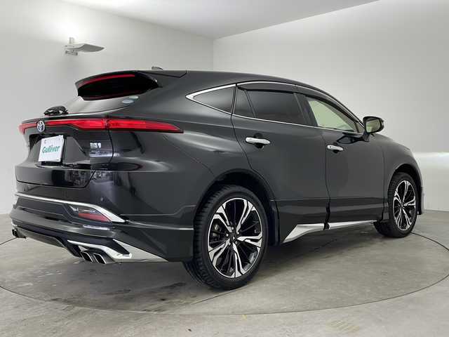 トヨタ ハリアー ハイブリッド Z レザーパッケージ 兵庫県 2021(令3)年 4.4万km プレシャスブラックパール ・純正12.3インチナビ&TV&Bluetooth&USB/HDMI接続&Apple CarPlay/Android Auto/・JBLプレミアムサウンド/・モデリスタエアロパーツ（フロント/サイド/リア）/・アラウンドビューモニター/・トヨタセーフティセンス/・プリクラッシュセーフティ/・レーントレーシングアラート/・レーダークルーズコントロール/・アダクティブハイビーム/・ロードサインアシスト/・前後コーナーセンサー/・ブラインドスポットモニター/・ABS/・横滑り防止機能/・盗難防止装置/・レザーシート/・パワーシート/・メモリーシート/・シートヒーター/・エアシート/・ステアリングヒーター/・ビルドインETC2.0/・電動リアゲート/・デジタルインナーミラー/・モデリスタ20インチアルミホイール/・LEDヘッドライト/・オートライト/・フロントフォグランプ/・100ボルト電源/・電動パーキングブレーキ/・ブレーキホールド/・ヘッドアップディスプレイ/・ステアリングスイッチ/・テレビキャンセラー/・スマートキー/・スペアキー/・W＋サイドエアバック/・カーテンエアバック/・プッシュスタート