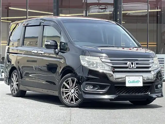 ホンダ ステップワゴン スパーダ Z クールスピリット 宮城県 2013(平25)年 7.6万km プレミアムスパークルブラックパール 登録時走行距離７５７０７ｋｍ/純正ナビ/両側パワースライドドア/クルーズコントロール/寒冷地仕様/１００Ｖ充電/パドルシフト/ビルトインＥＴＣ/ディスチャージヘッドライト/フォグランプ/ＬＥＤルームランプ