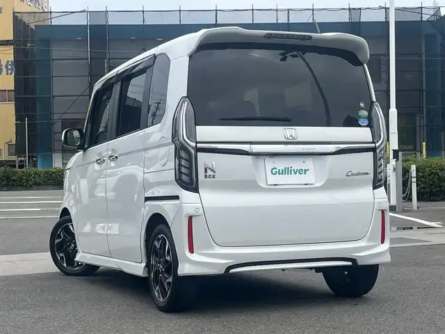 ホンダ Ｎ ＢＯＸ カスタム G L ターボ ホンダセンシング 愛媛県 2018(平30)年 4.2万km プラチナホワイトパール 登録時走行距離42099km/純正8インチナビ（VXU-195NBi）/CD/DVD/フルセグTV/Bluetooth/バックカメラ/フリップダウンモニター/純正ドライブレコーダー（フロント）/ビルトインETC/ホンダセンシング/衝突軽減ブレーキ/レーンキープサポート/追従クルーズコントロール/リヤコーナーセンサー/両側パワースライドドア/ロールサンシェード/スマートキー/オートライト/LEDヘッドライト/LEDフォグランプ/純正アルミホイール