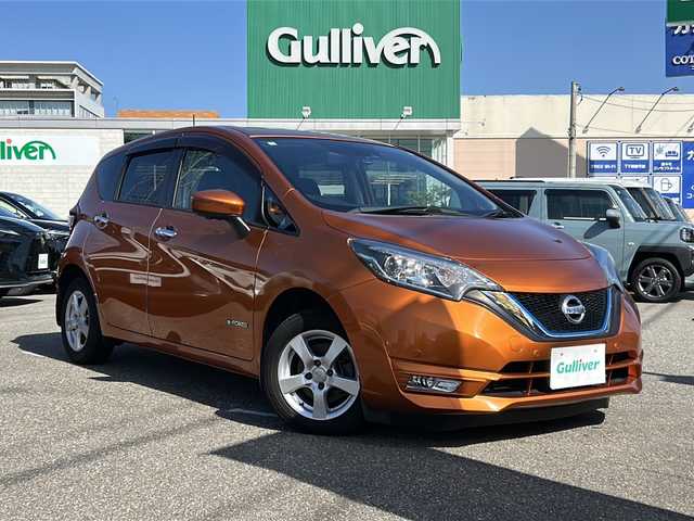 日産 ノート e－パワー X 石川県 2016(平28)年 4.5万km プレミアムコロナオレンジ 純正ナビ7インチ/フルセグTV/全方位カメラ/ドライブレコーダー/ETC/スマートルームミラー/コーナーセンサー/衝突被害軽減システム/横滑り防止装置/レーンキープアシスト/オートライト/スタッドレスタイヤ付/プッシュスタート/スマートキー/純正フロアマット