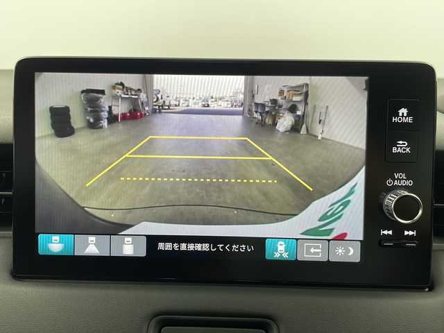 ホンダ ヴェゼル ハイブリッド e:HEV Z 栃木県 2025(令7)年 0.1千km クリスタルブラックパール 登録済未使用車/純正9インチナビ/（AM/FM/フルセグTV/Bluetooth）/バックカメラ/ホンダセンシング/・衝突軽減ブレーキ/・レーンキープアシスト/・レーダークルーズコントロール/・オートマチックハイビーム/・クリアランスソナー/ブラインドスポットモニター/ETC2.0/シートヒーター/ステアリングヒーター/ワイヤレス充電/ハーフレザー/パドルシフト/パワーバックドア/スマートキー/プッシュスタート/オートLEDヘッドライト/フォグランプ/ダウンヒルアシスト/純正アルミホイール/横滑り防止装置/電動格納ミラー/ステアリングスイッチ