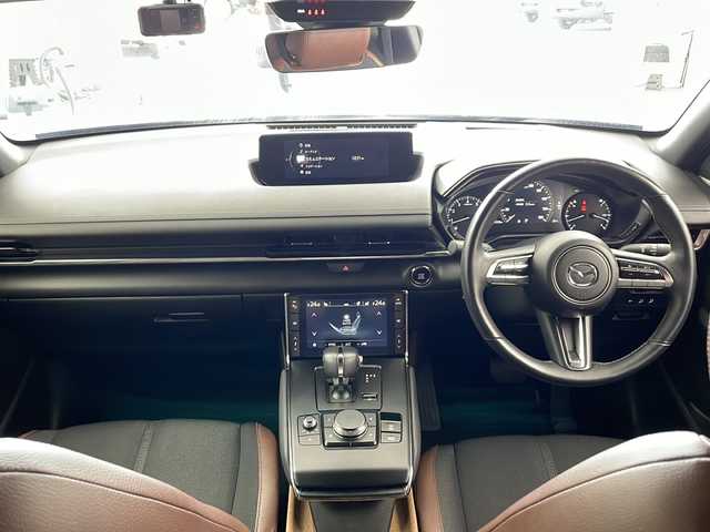 マツダ ＭＸ－３０ インダストリアルクラシック 兵庫県 2021(令3)年 2.7万km マシーングレープレミアムM ・純正ナビ/Bluetooth/AM/FM/TV/HDMI/・バックカメラ/・スマートブレーキサポート/・スマートブレーキサポート（後退時）/・緊急時車線維持支援/・ディスタンス＆スピードアラート/・レーンキープアシスト/・後側方接近車両検知/・ブラインドスポットモニター/・レーダクルーズコントロール/・オートハイビーム/・ステアリングスイッチ/・ステアリングヒーター/・ハーフレザーシート/・前席シートヒーター/・運転席パワーシート（メモリー付き）/・純正フロアマット/・純正アルミホイールタイヤ/・LEDヘッドライト/・前後ドライブレコーダー/・ETC/・取扱説明書/・保証書/・スペアキー/・ベーシックパッケージ/・エクステリアパッケージ/・インテリアパッケージ/・ユーティリティーパッケージ