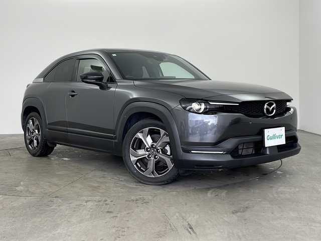 マツダ ＭＸ－３０ インダストリアルクラシック 兵庫県 2021(令3)年 2.7万km マシーングレープレミアムM ・純正ナビ/Bluetooth/AM/FM/TV/HDMI/・バックカメラ/・スマートブレーキサポート/・スマートブレーキサポート（後退時）/・緊急時車線維持支援/・ディスタンス＆スピードアラート/・レーンキープアシスト/・後側方接近車両検知/・ブラインドスポットモニター/・レーダクルーズコントロール/・オートハイビーム/・ステアリングスイッチ/・ステアリングヒーター/・ハーフレザーシート/・前席シートヒーター/・運転席パワーシート（メモリー付き）/・純正フロアマット/・純正アルミホイールタイヤ/・LEDヘッドライト/・前後ドライブレコーダー/・ETC/・取扱説明書/・保証書/・スペアキー/・ベーシックパッケージ/・エクステリアパッケージ/・インテリアパッケージ/・ユーティリティーパッケージ