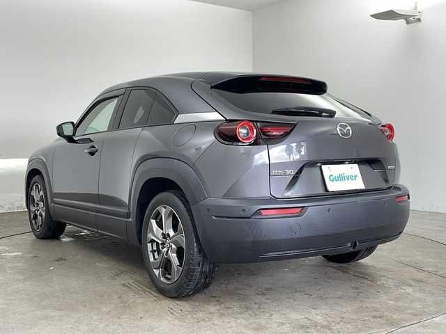 マツダ ＭＸ－３０ インダストリアルクラシック 兵庫県 2021(令3)年 2.7万km マシーングレープレミアムM ・純正ナビ/Bluetooth/AM/FM/TV/HDMI/・バックカメラ/・スマートブレーキサポート/・スマートブレーキサポート（後退時）/・緊急時車線維持支援/・ディスタンス＆スピードアラート/・レーンキープアシスト/・後側方接近車両検知/・ブラインドスポットモニター/・レーダクルーズコントロール/・オートハイビーム/・ステアリングスイッチ/・ステアリングヒーター/・ハーフレザーシート/・前席シートヒーター/・運転席パワーシート（メモリー付き）/・純正フロアマット/・純正アルミホイールタイヤ/・LEDヘッドライト/・前後ドライブレコーダー/・ETC/・取扱説明書/・保証書/・スペアキー/・ベーシックパッケージ/・エクステリアパッケージ/・インテリアパッケージ/・ユーティリティーパッケージ